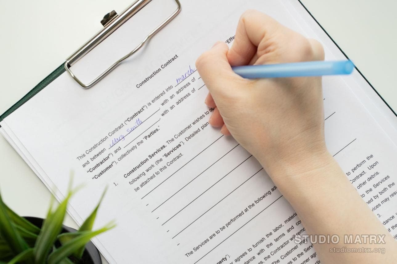 Homeowner signing handover document