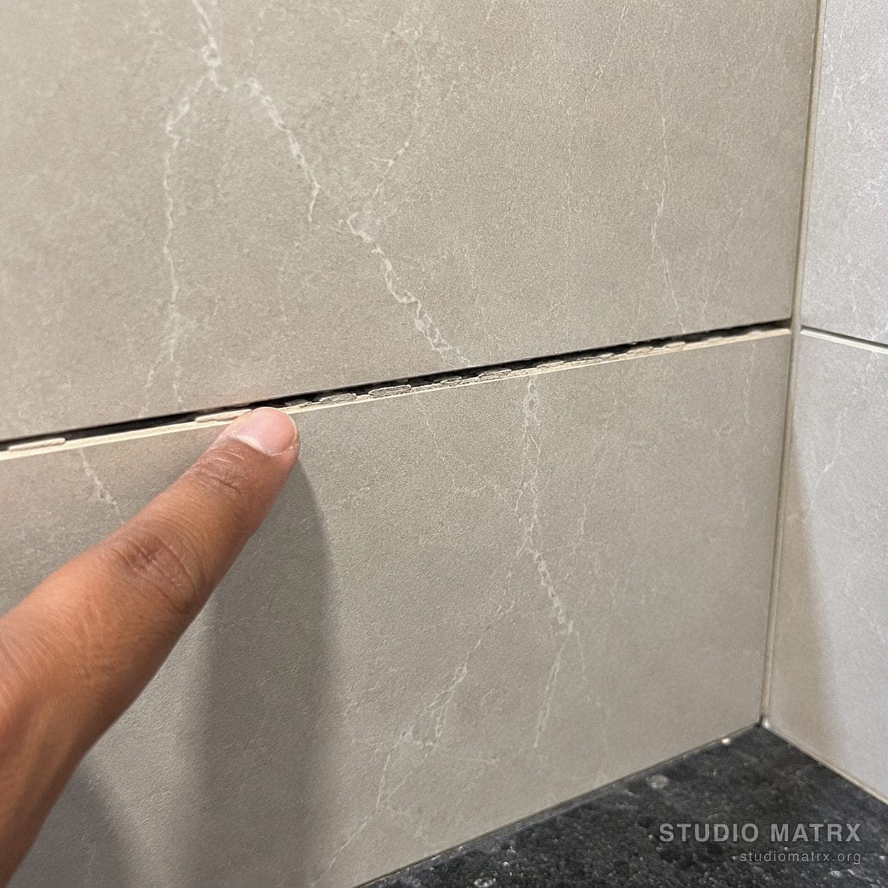 Tile grout gap defect