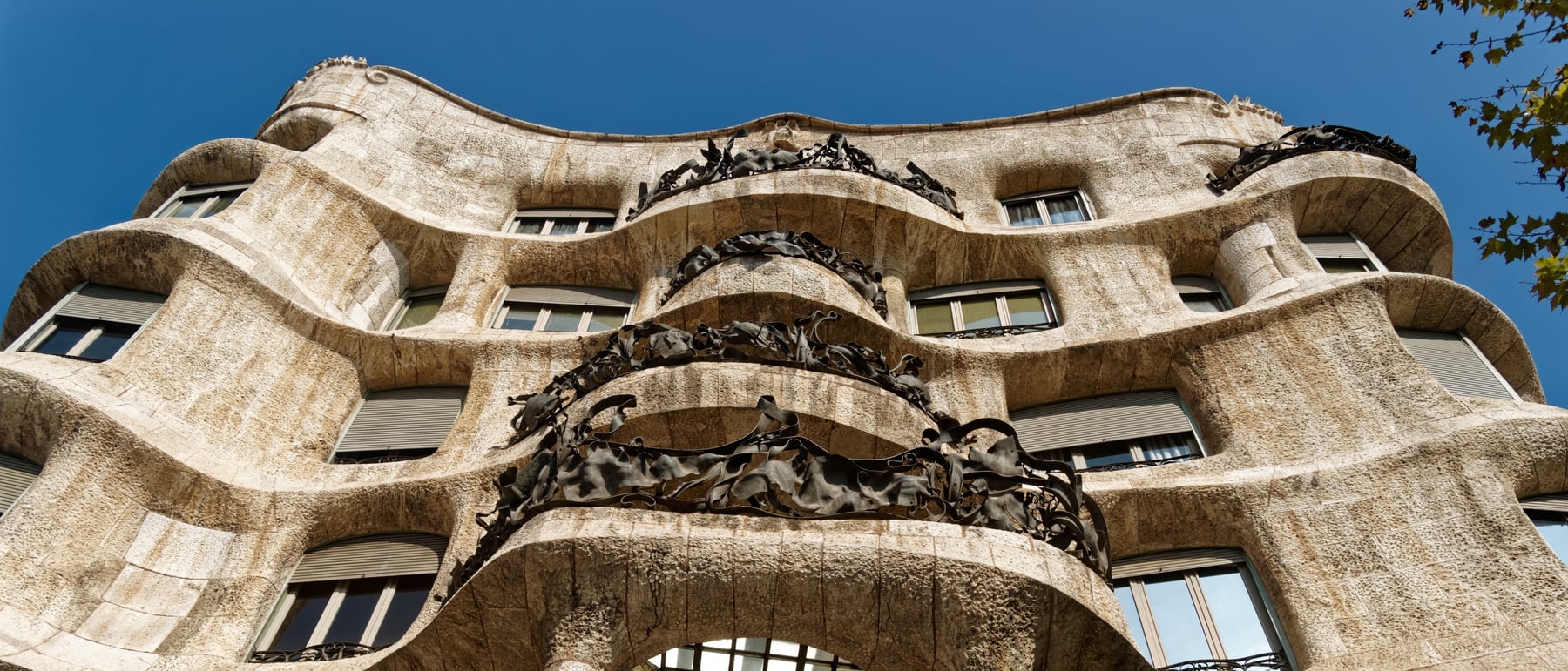 Casa Milà (La Pedrera) — An undulating stone quarry of a building.