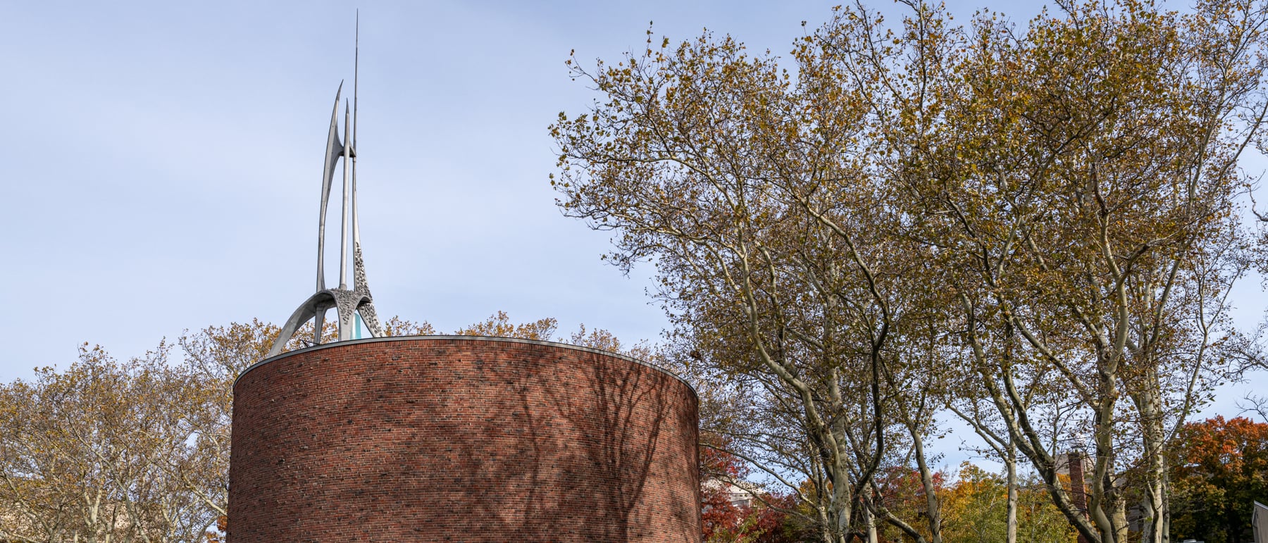 Chapel at MIT / Kresge — A cylindrical brick chapel lit from above.