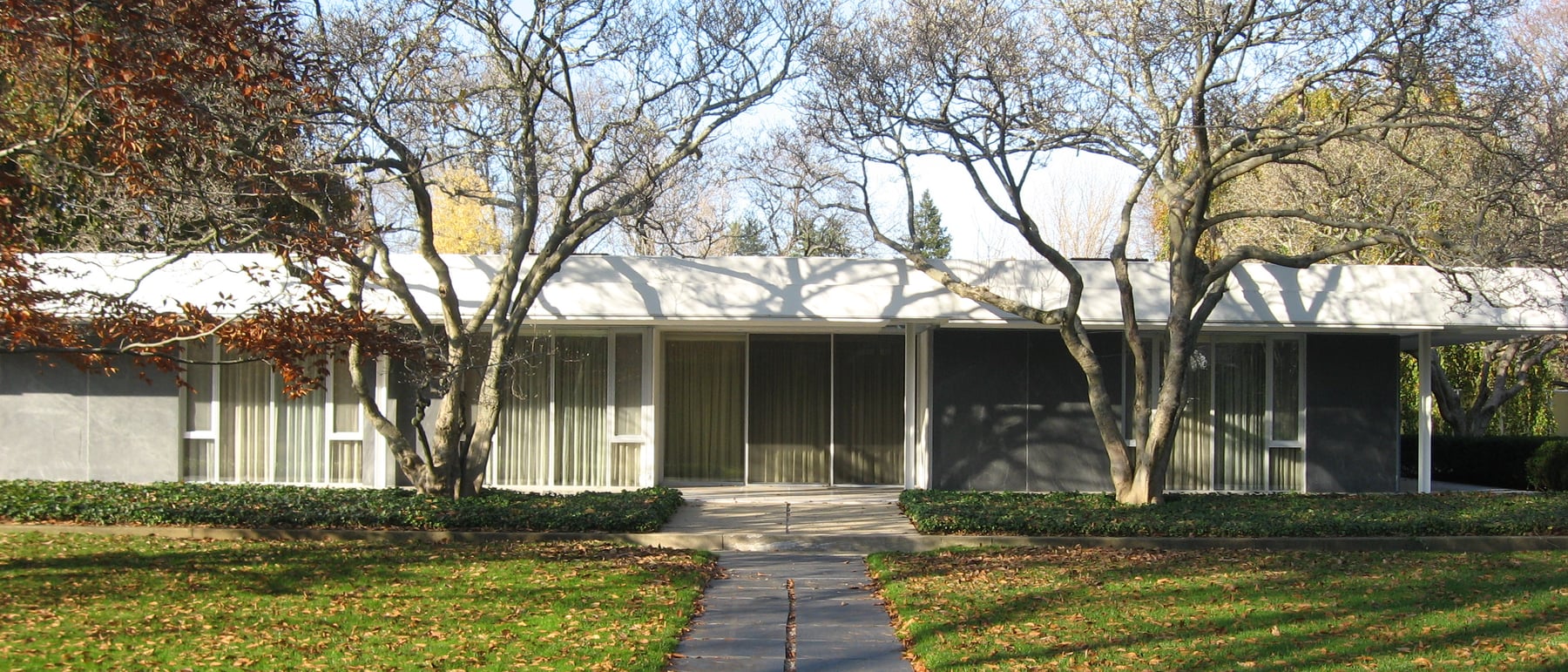 Chapel of Notre Dame / Miller House — Mid-century domestic modernism with Dan Kiley's landscape.