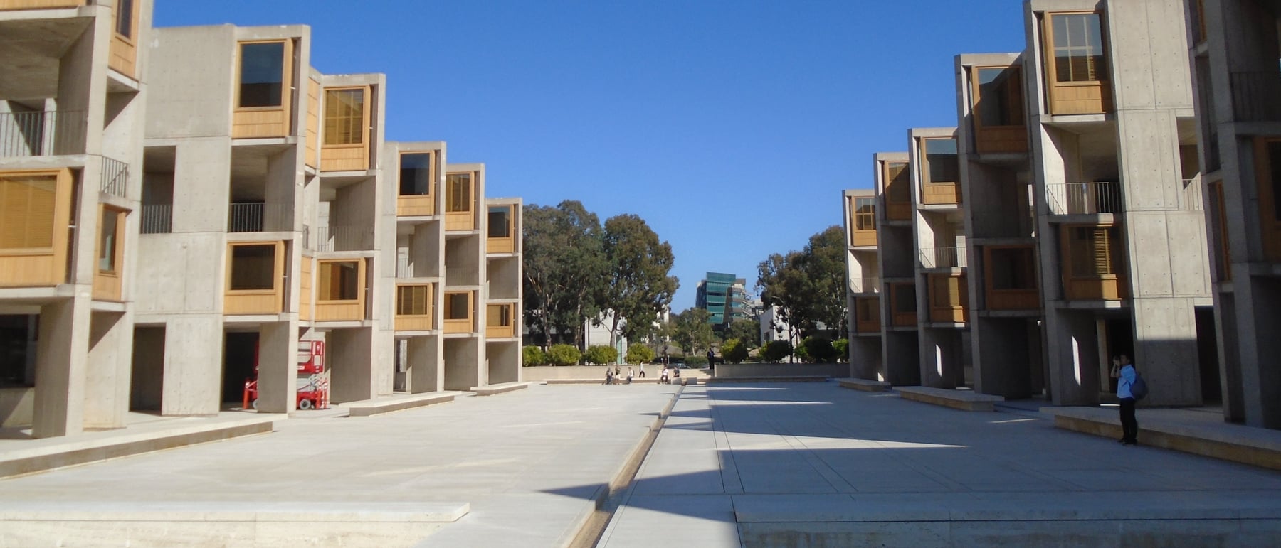 Salk Institute — Symmetry, travertine and a channel of water to the sea.
