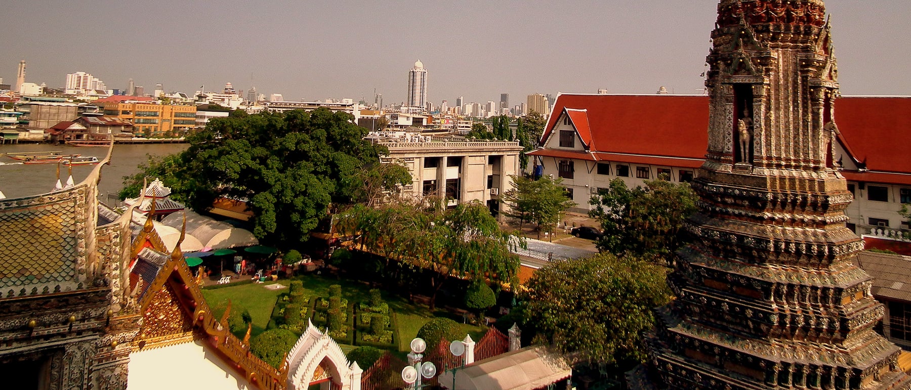 Wat Arun — A porcelain-encrusted prang on the river.
