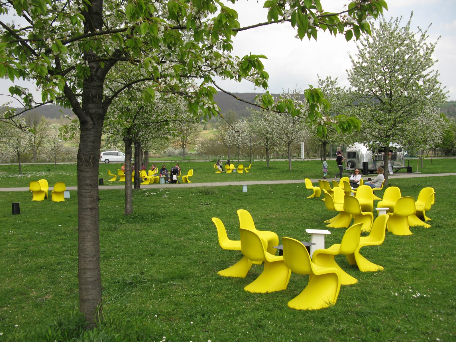 Verner Panton's Panton chair (1967) — the first chair moulded from a single piece of plastic, cantilevered and stackable.