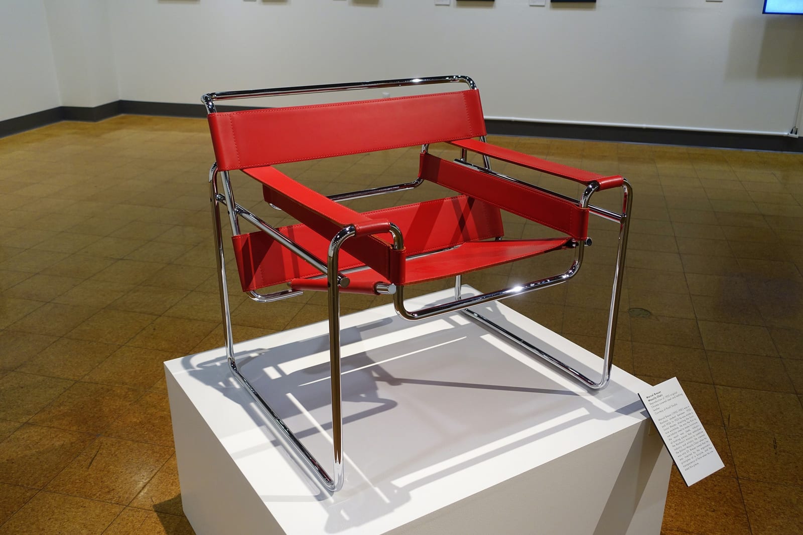 Marcel Breuer's Wassily / Model B3 (1925) — the first chair in bent tubular steel, a leather club chair abstracted to straps and chrome.