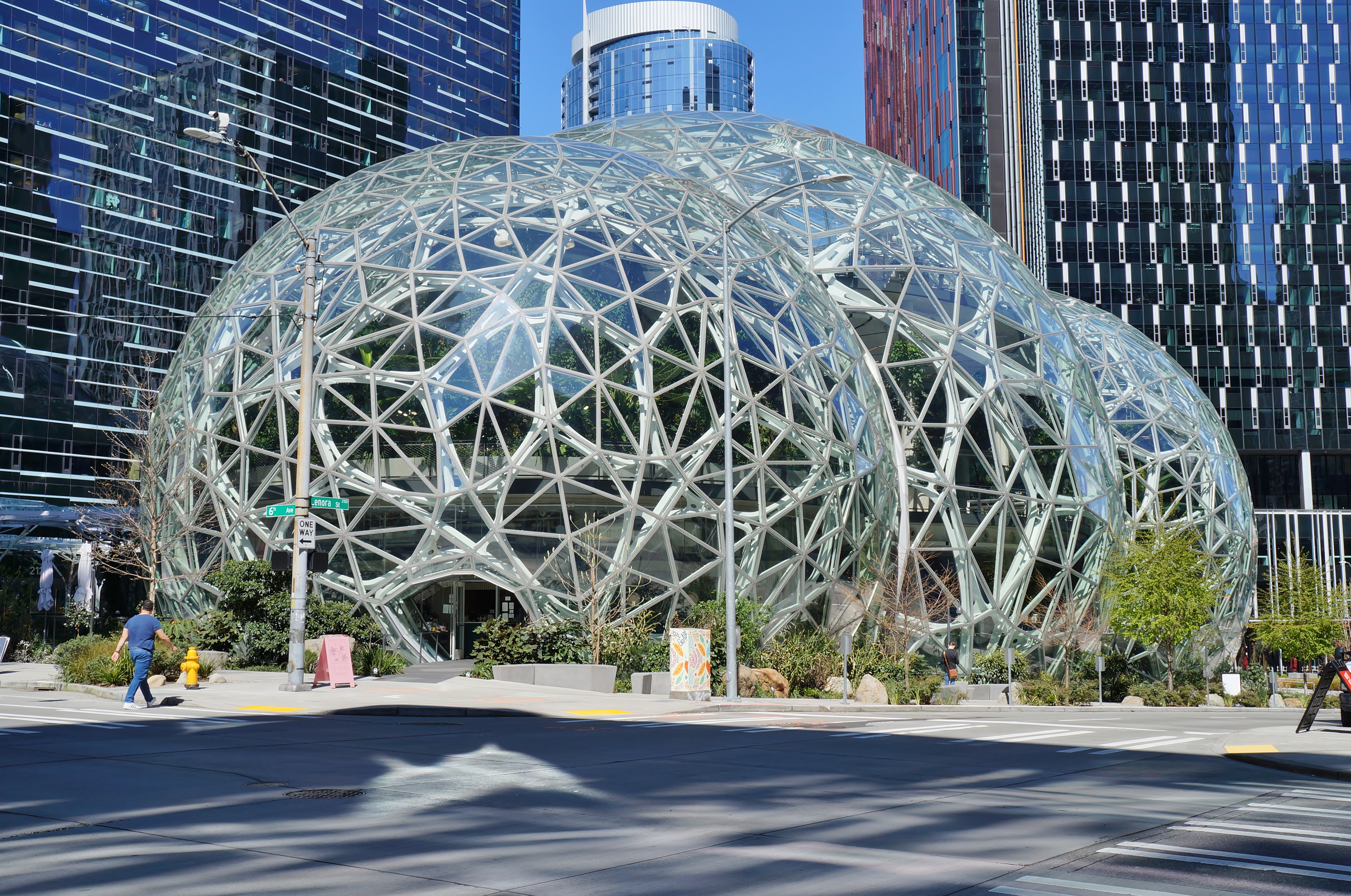 Exterior view of the three Amazon Spheres domes from 6th Avenue in downtown Seattle.
