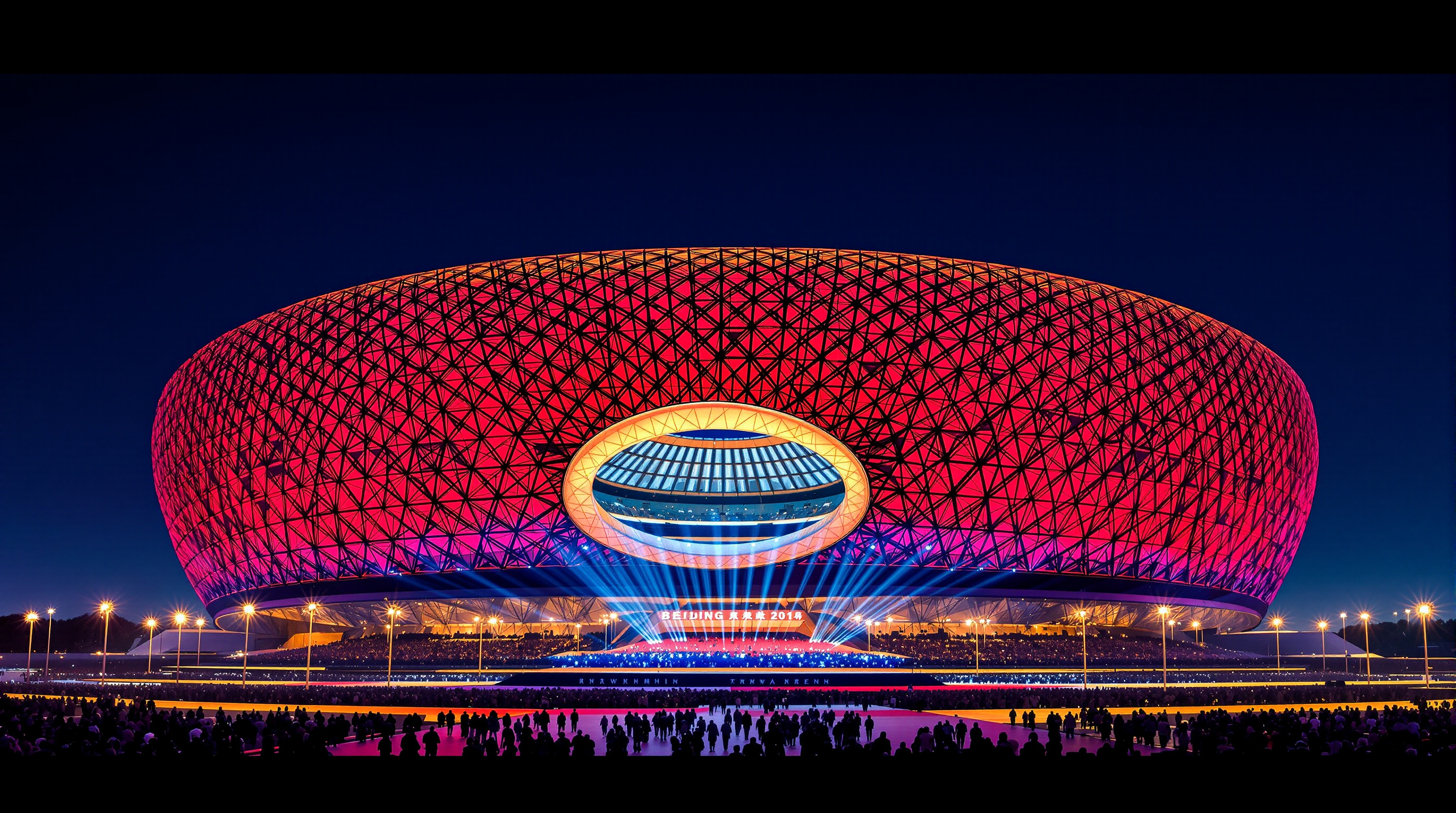 The Bird's Nest seen from across the Olympic Green at night during a ceremony, the vast steel lattice lit deep red and gold, crowds gathered on the plaza below and the open oculus glowing above the packed bowl