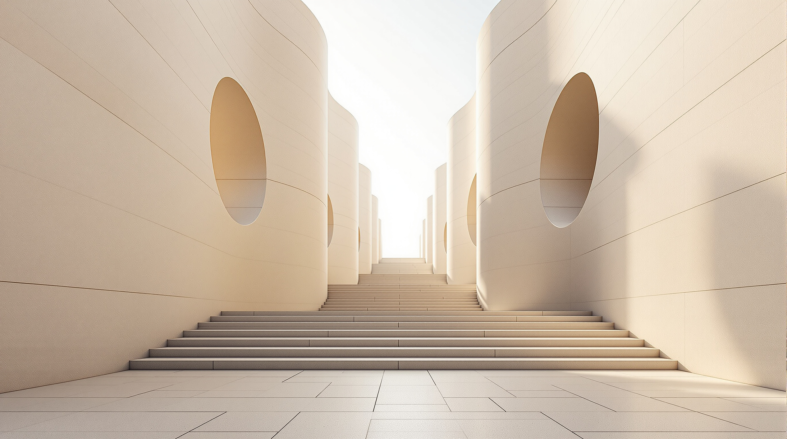 Looking up the sloping lioz-limestone plaza of the Champalimaud Centre between two towering curved pale-stone walls pierced by large circular openings, the honed pale stone glowing warm in low sun, the paving rising toward open sky ahead