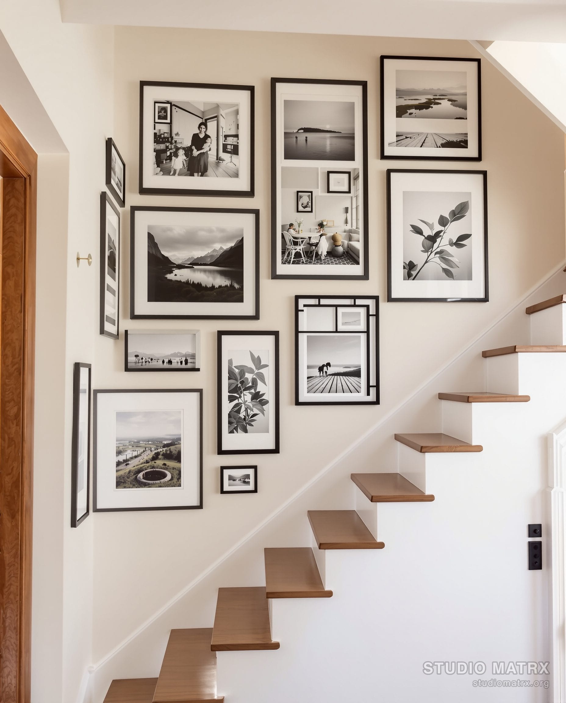 A staircase gallery wall climbing the stairwell