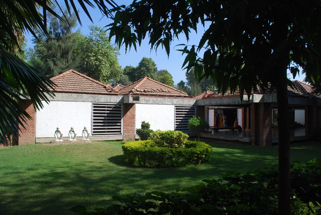Photograph of several of the Gandhi Smarak Sangrahalaya's modular brick-and-tile pavilions at Sabarmati Ashram, Ahmedabad.