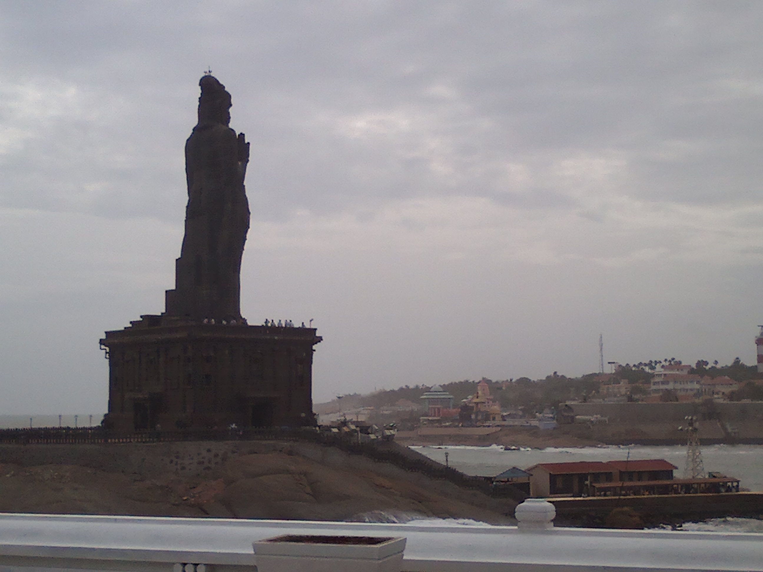 The 133-foot Thiruvalluvar Statue on the adjacent rock at Kanyakumari.