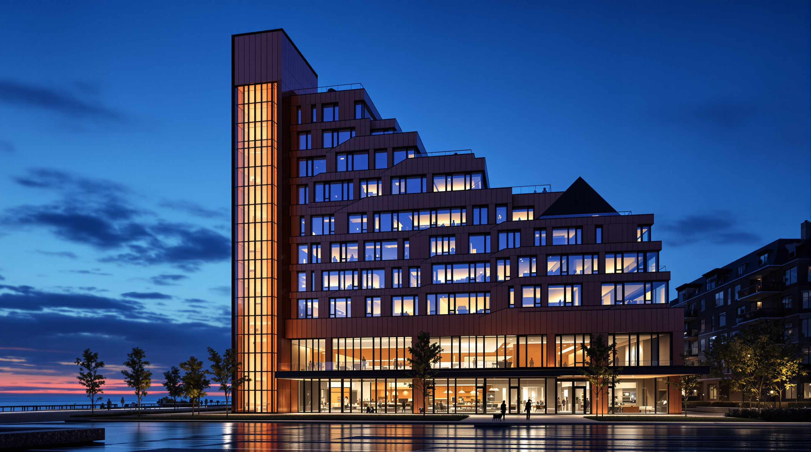 Exterior view of Limberlost Place from the Toronto waterfront at dusk, its stepped copper-toned facade rising ten storeys, the tall glazed solar chimney glowing warmly on one flank, the peaked roofline sloping toward the lake