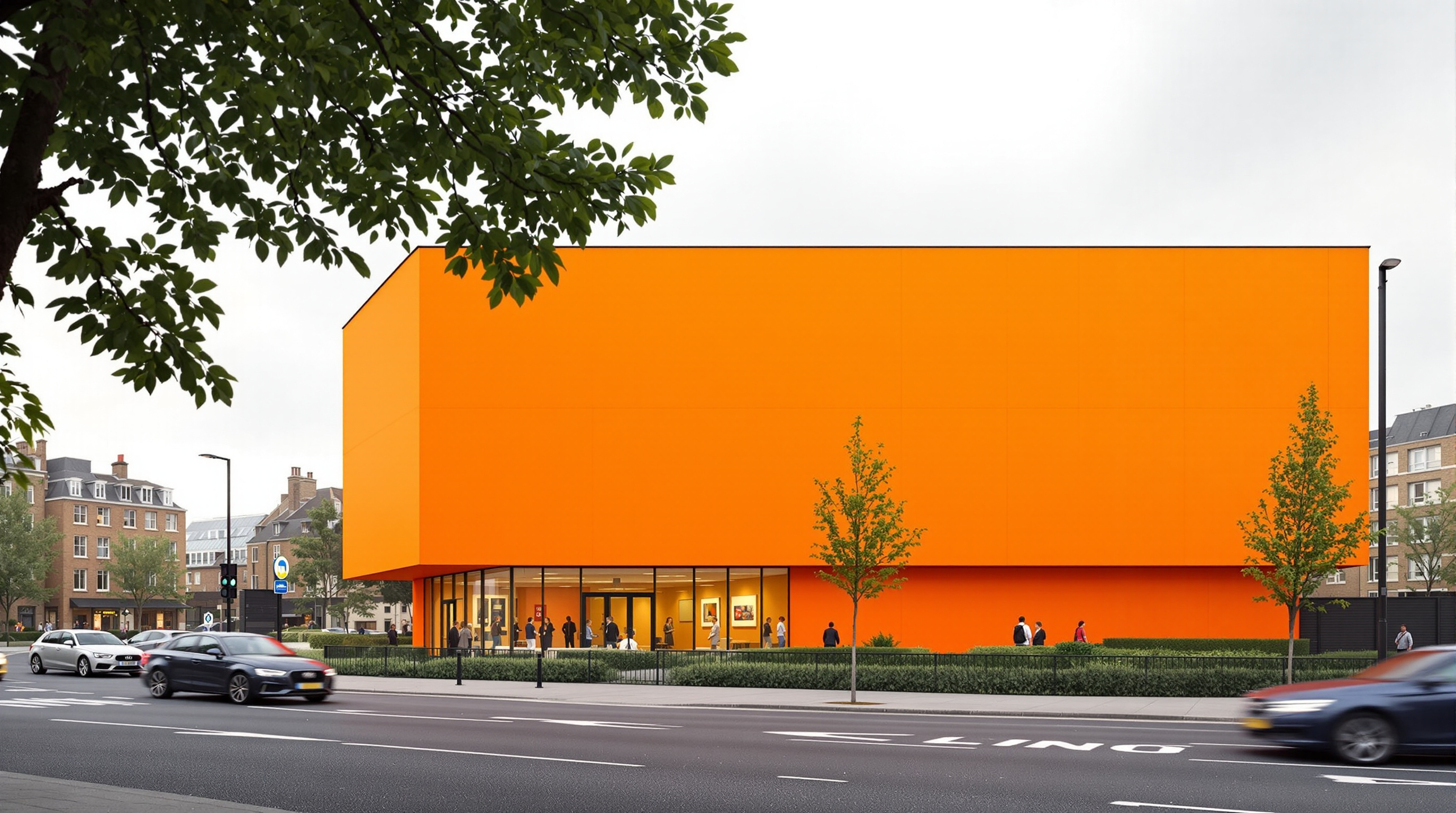 The bright orange, windowless outer wall of the Rogers Stirk Harbour Maggie's West London centre facing a busy hospital road, its enclosing form concealing the garden courtyard within
