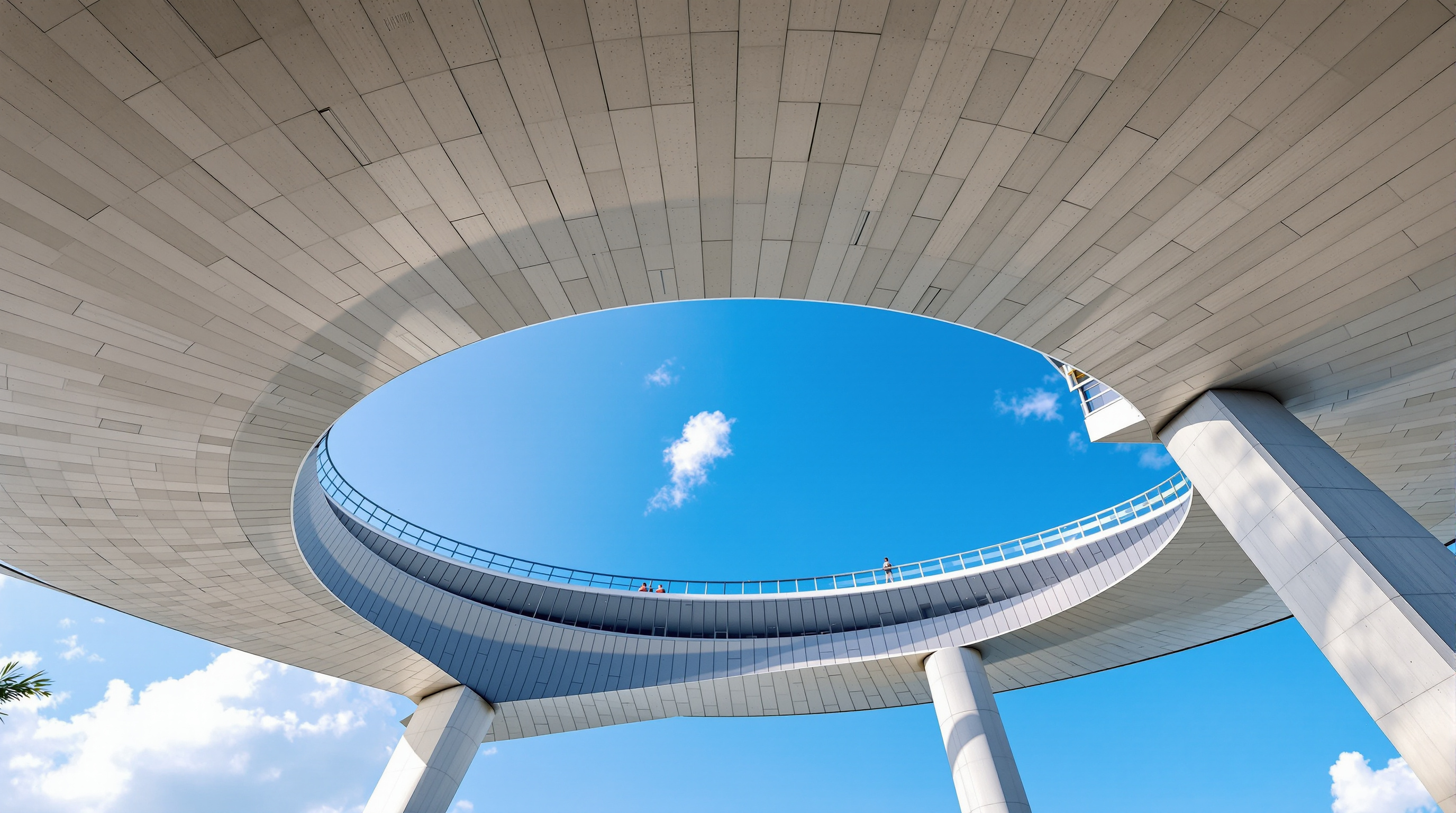 Looking up at the underside of the Marina Bay Sands SkyPark cantilever from the ground, the smooth curved soffit of the deck projecting far beyond the last leaning tower against a blue Singapore sky, conveying the enormous unsupported reach