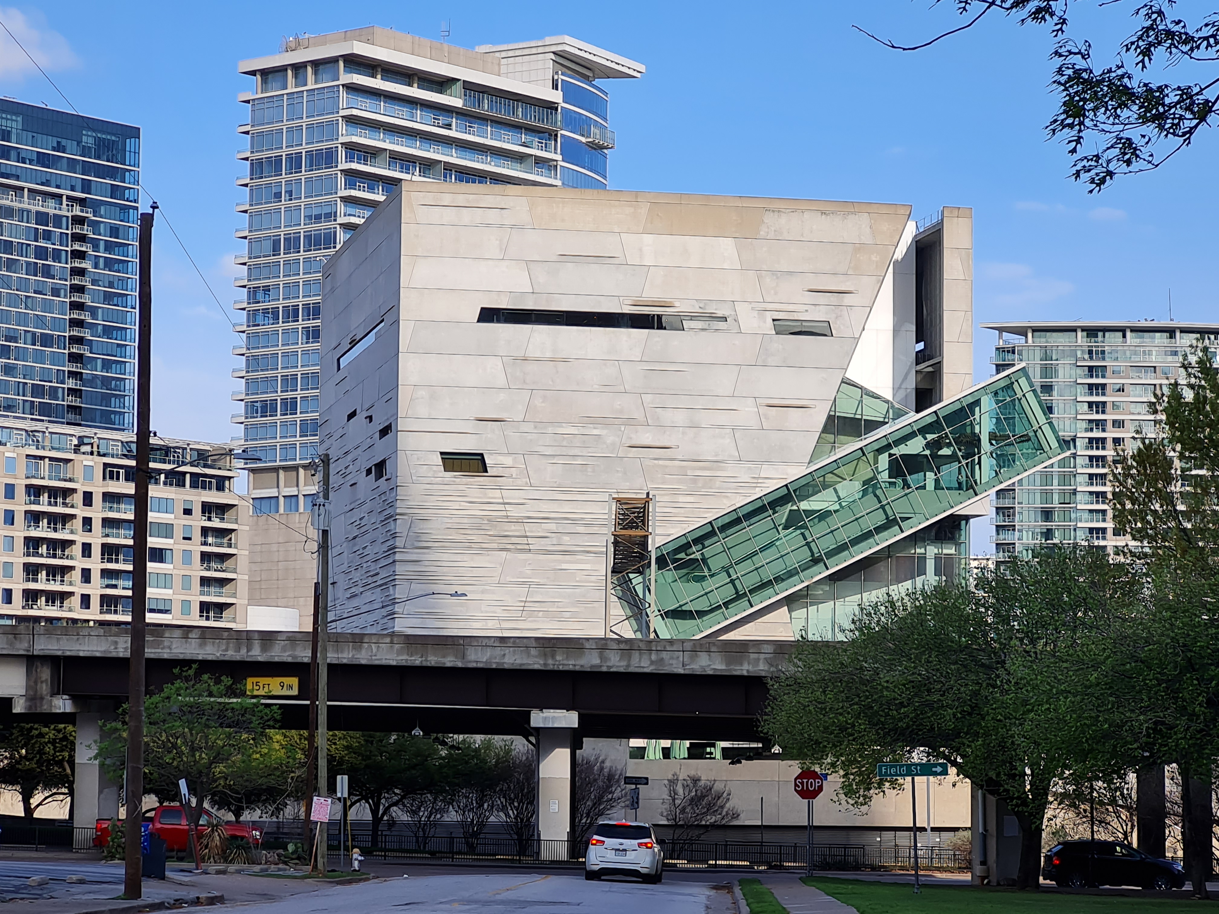 Exterior view of the Perot Museum cube and striated concrete facade from the southeast.