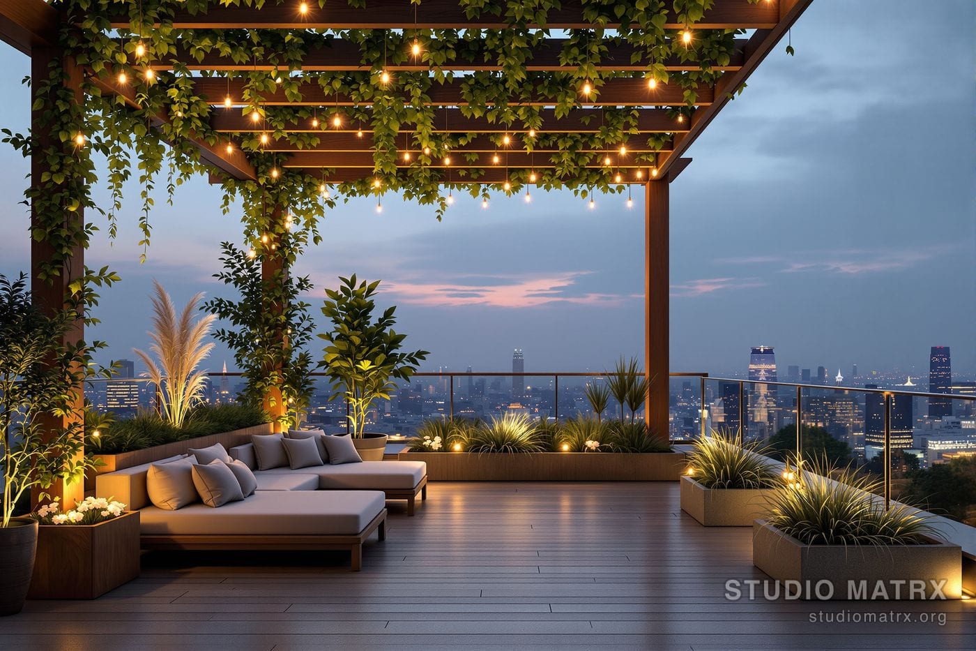 A private rooftop penthouse sky-deck terrace at dusk - low lounge seating under a timber pergola threaded with greenery, planters of frangipani and ornamental grasses, warm string lighting, and a glass parapet railing with the city skyline beyond.