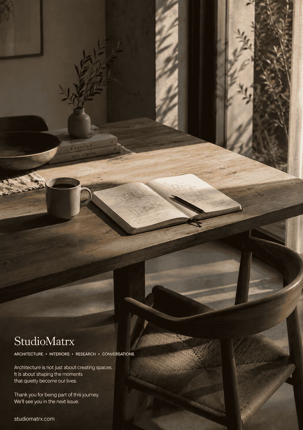 A quiet wooden kitchen table in soft daylight with a notebook, pencil and a cup, an architect's sign-off image