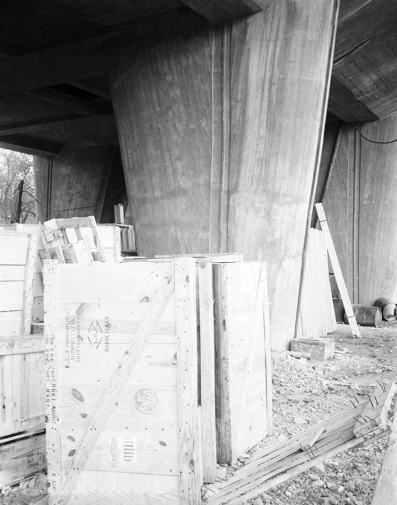 The Unité d’Habitation raised on its massive sculptural concrete pilotis, photographed during construction