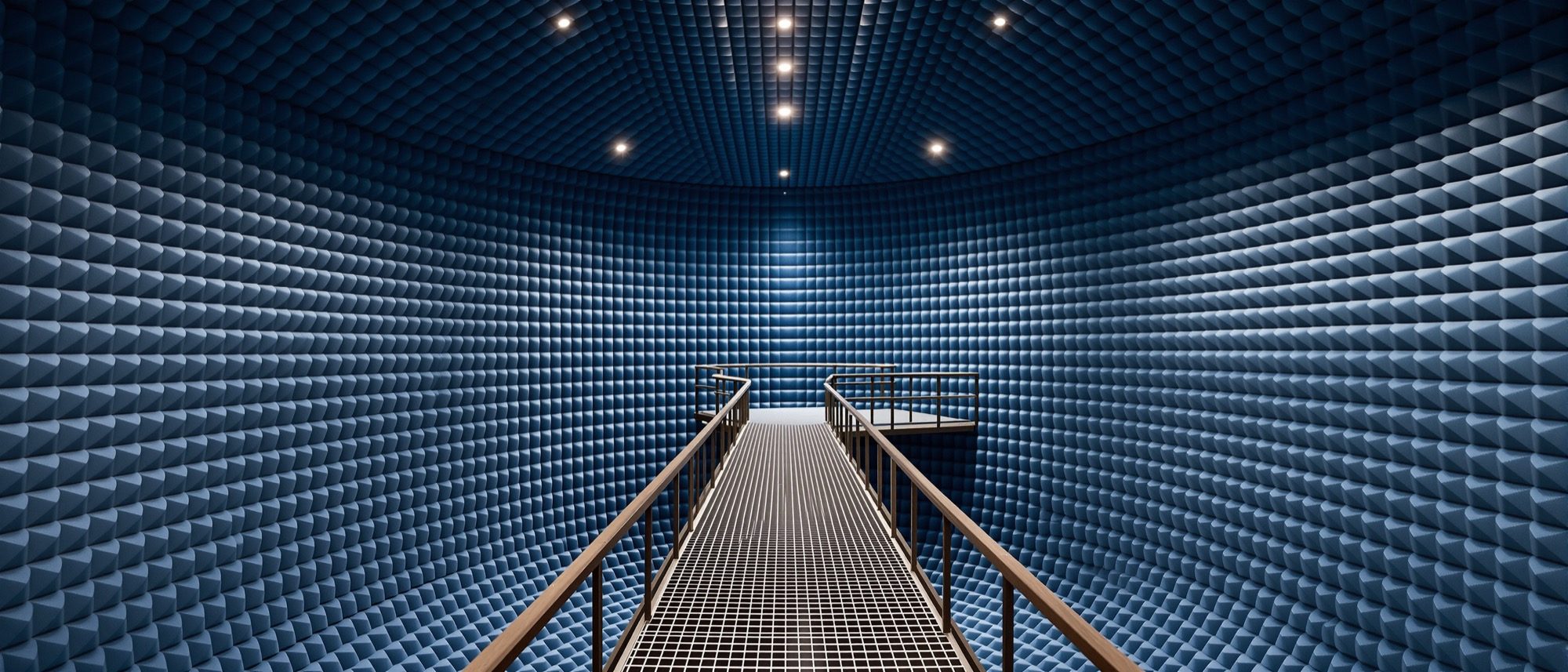 An anechoic chamber lined with acoustic foam wedges — a room built to absorb all sound, where the physics of acoustics is laid bare.