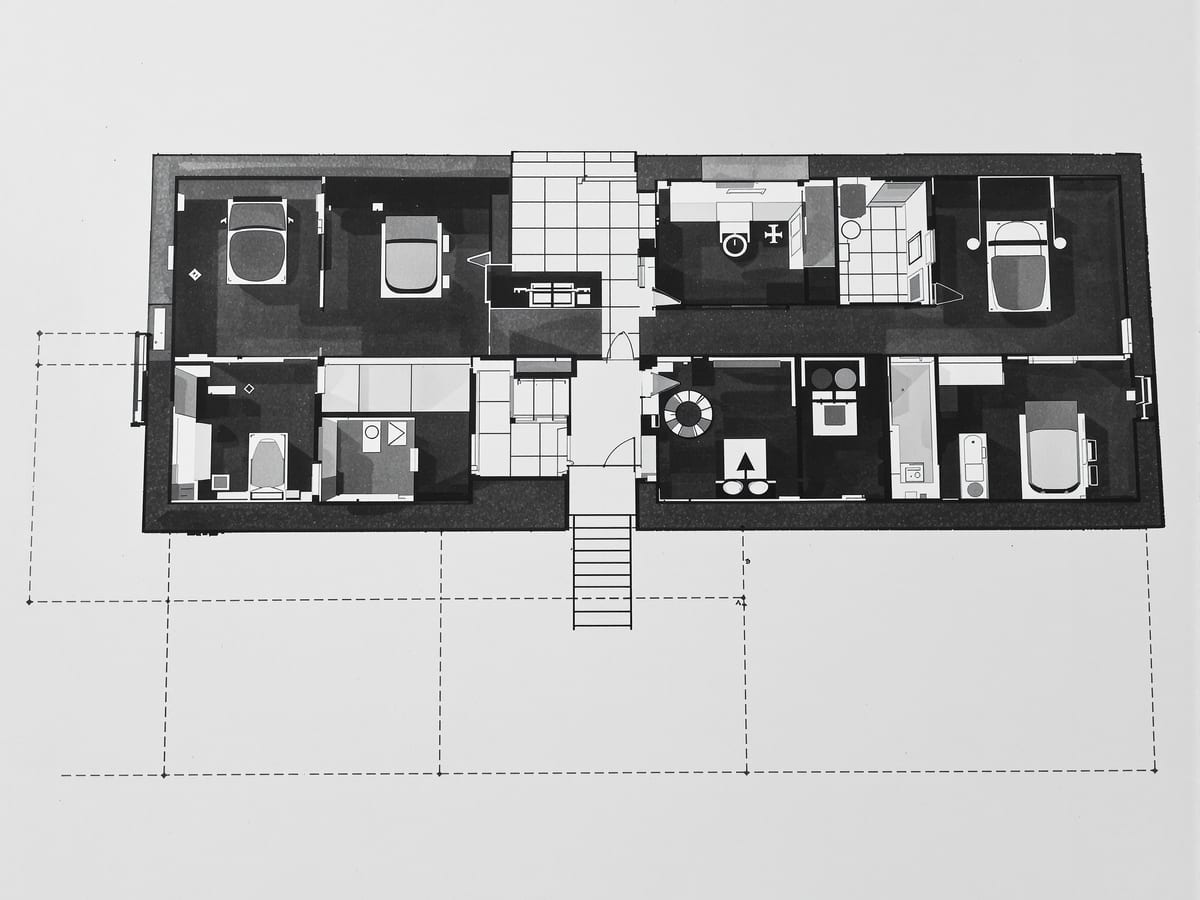 A crisp floor plan in ink showing blackened cut walls and columns set against the pale field of the rooms below the cut.