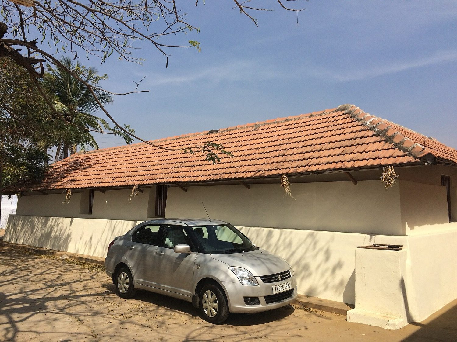 A roof of interlocking red Mangalore clay tiles.