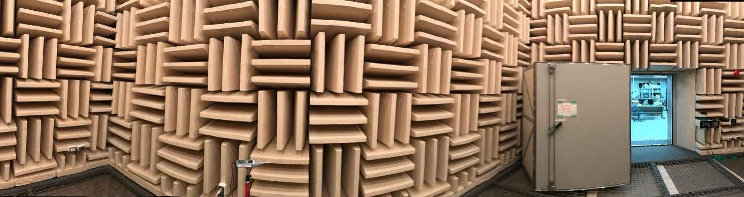 An anechoic chamber, its wedges giving near-total absorption (α ≈ 1) — the opposite of a reverberant room.