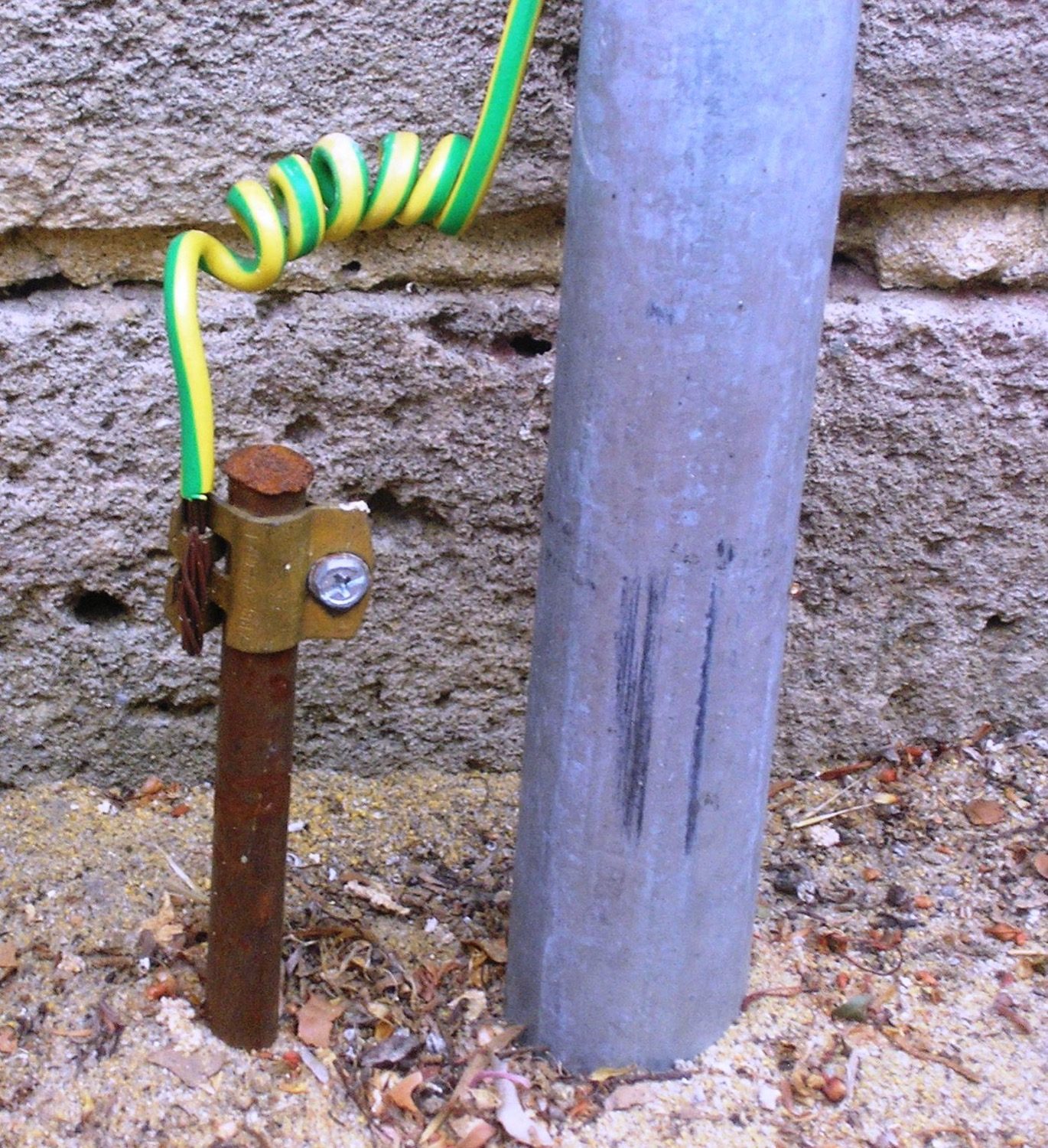 An earthing electrode pit with its inspection chamber — the safe path to ground for fault current.