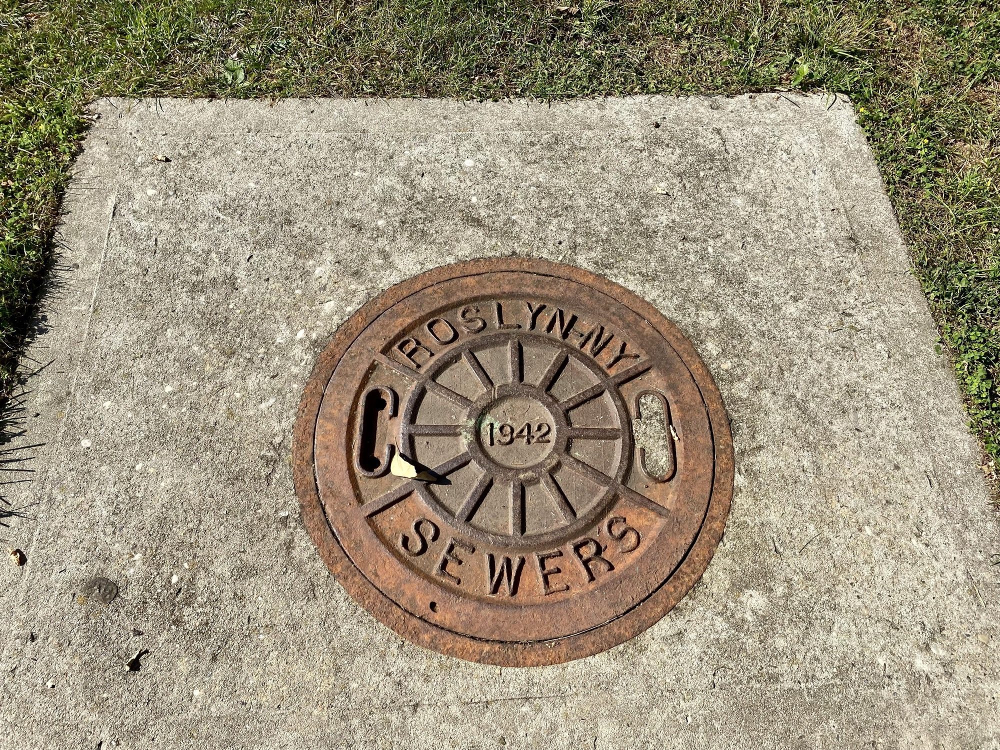 A sewer manhole / inspection chamber under construction — access for cleaning and rodding the underground drain.