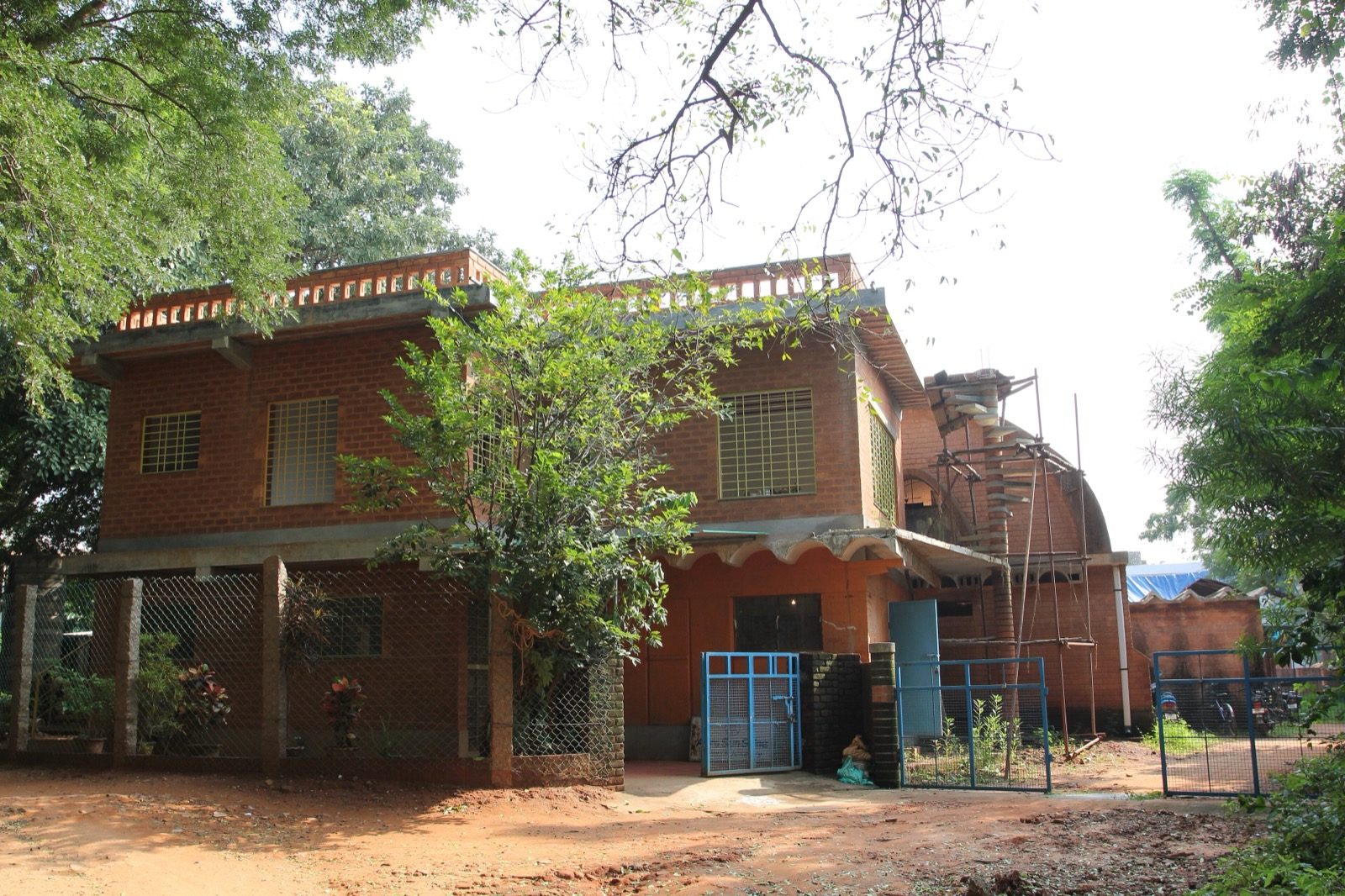 The Auroville Earth Institute, Tamil Nadu — compressed-earth-block vaults and domes; the low-embodied-energy ecological building that Chitra Vishwanath's Biome also champions.