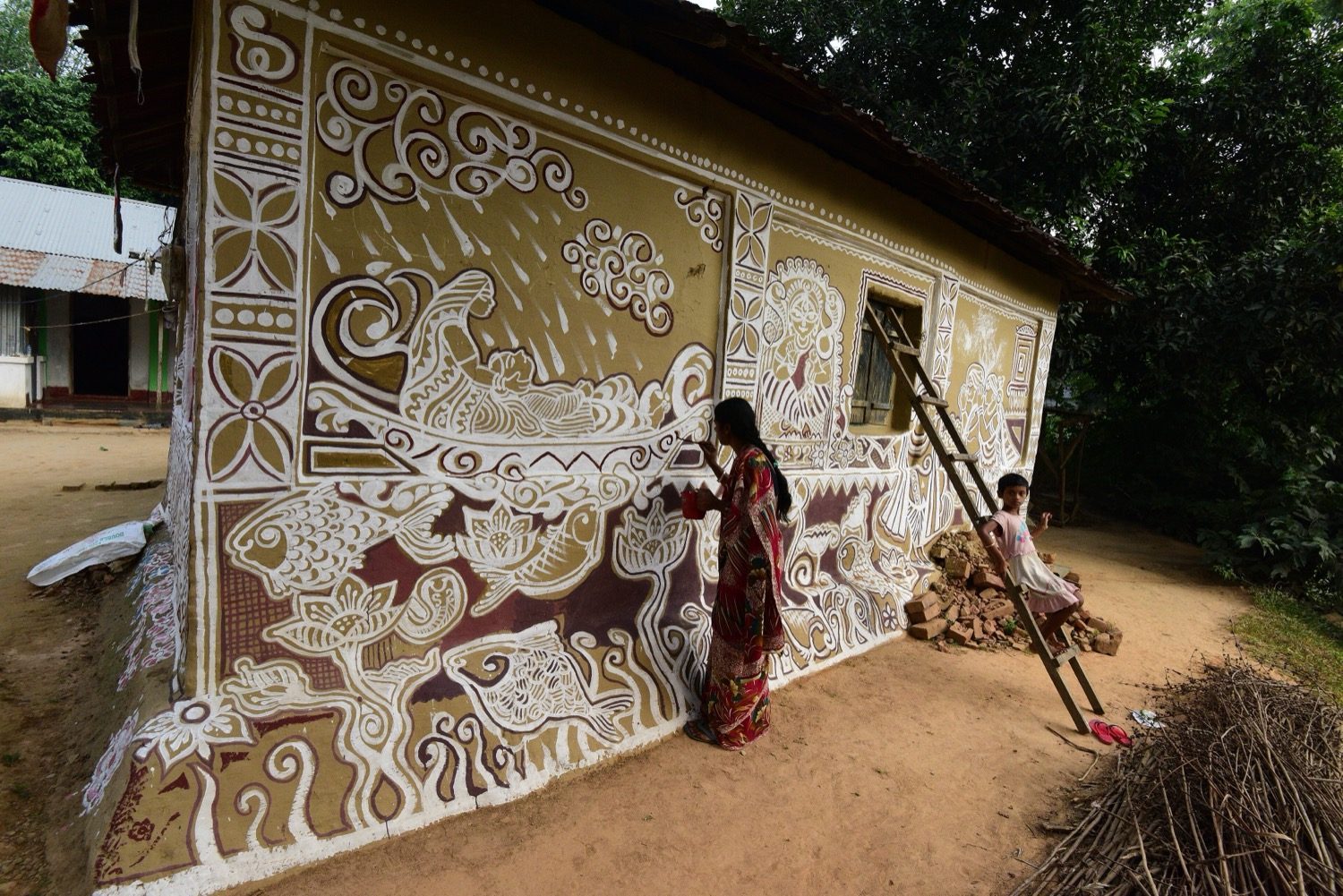 Villagers in their settlement — participatory design begins by listening to those who live there.