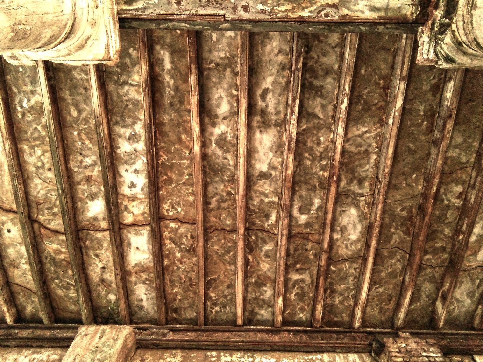 Exposed timber roof beams and rafters — structural wood working in bending.