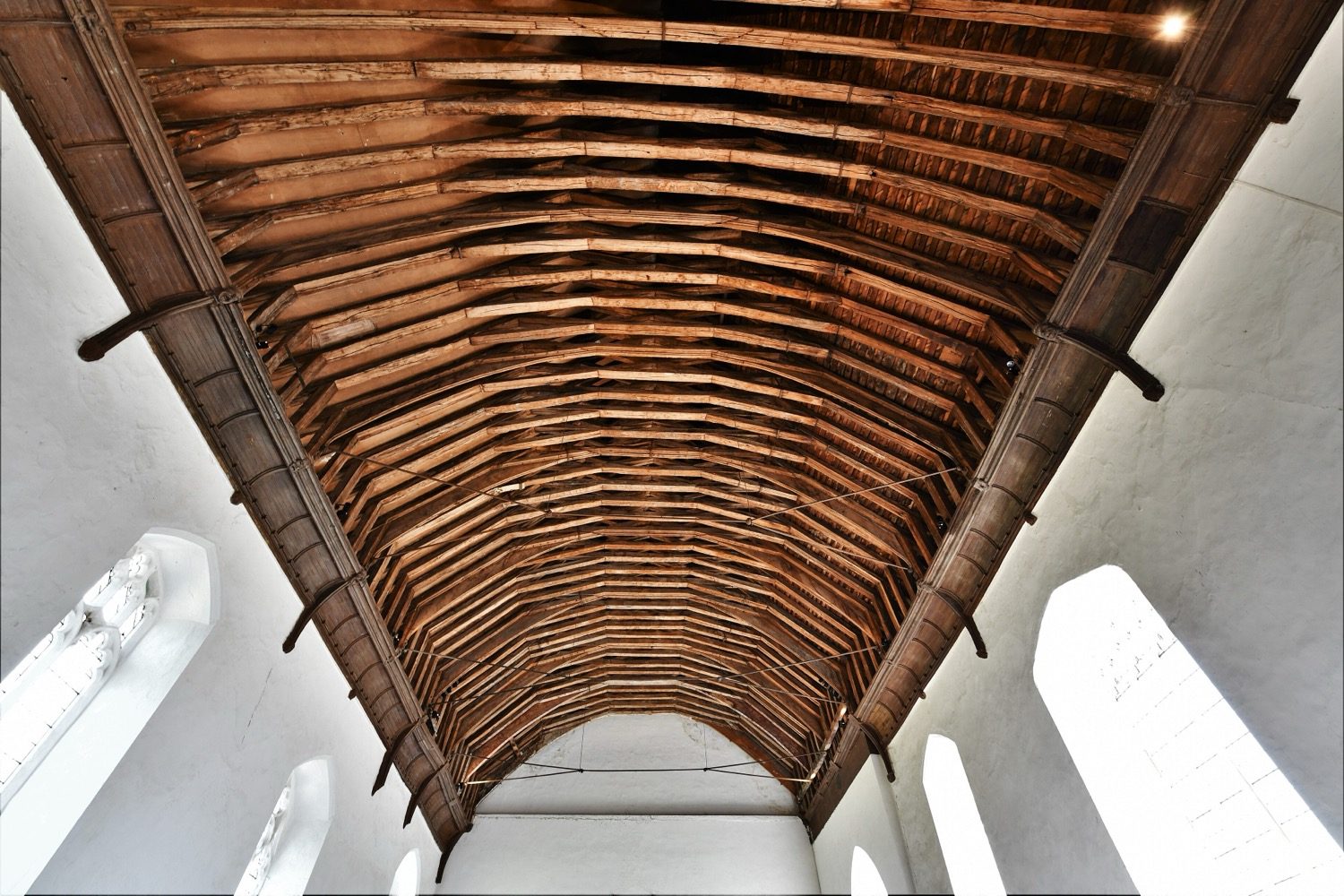 A timber-framed roof structure — graded timber beams sized by the working-stress method.