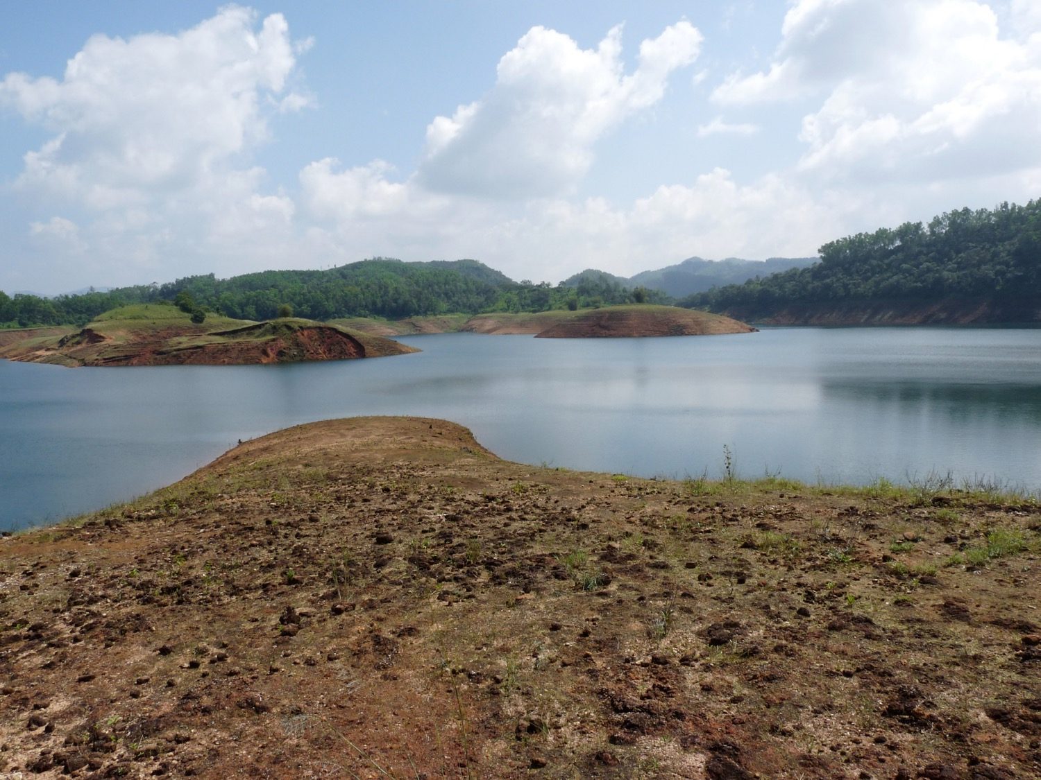 A large dam and reservoir — water resource and ecological cost in one view.
