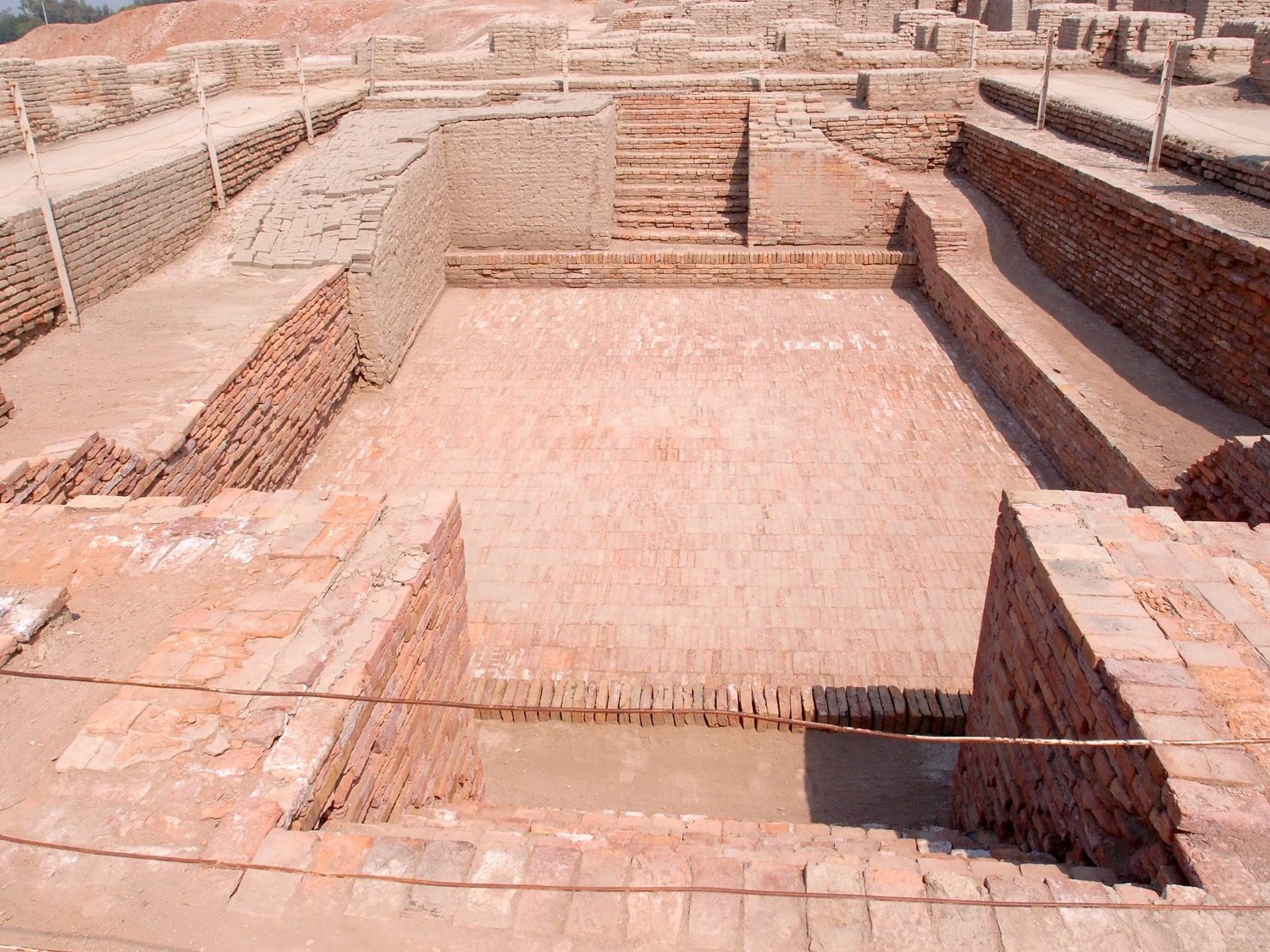 The Great Bath at Mohenjo-Daro — a watertight brick tank reached by steps, among the earliest public water structures.
