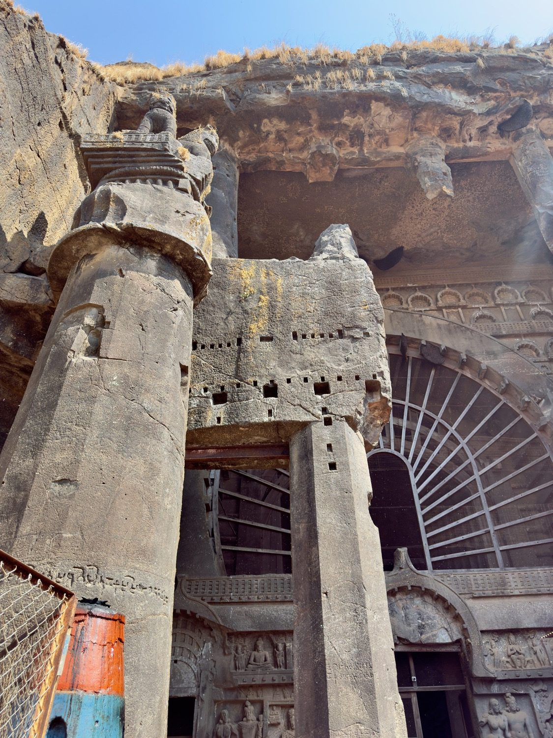 The interior of the great chaitya at Karli — a barrel-vaulted apsidal hall, columns leading to the votive stupa.