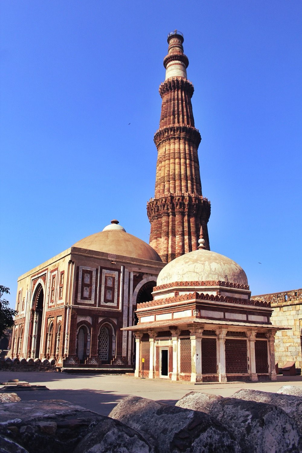 The Alai Darwaza (1311) — the first true arch and dome on Islamic principles in India, in red sandstone and white marble.