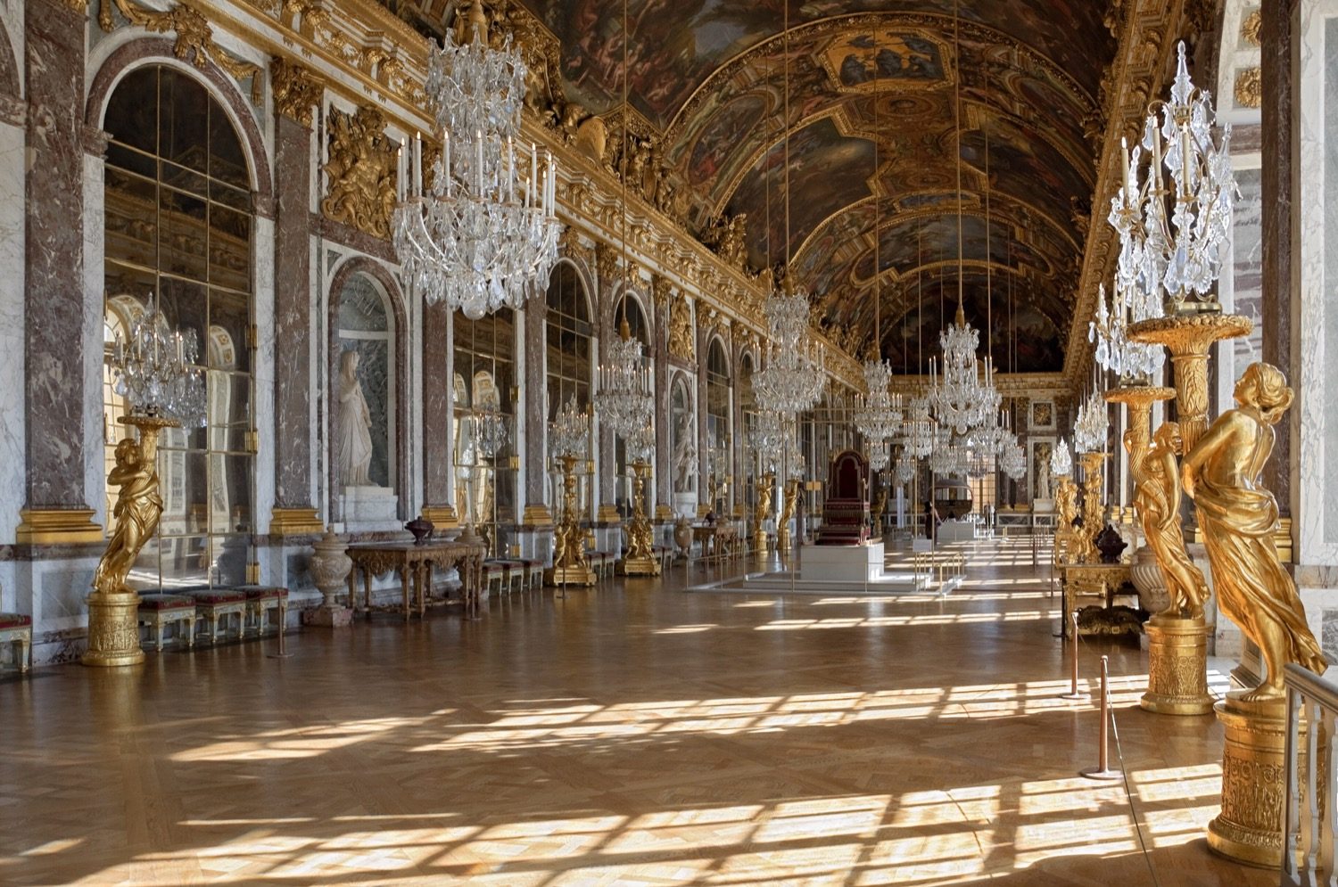 The Hall of Mirrors (Galerie des Glaces) at Versailles — 73 m long, 357 mirrors facing the garden windows, ceiling by Charles Le Brun.