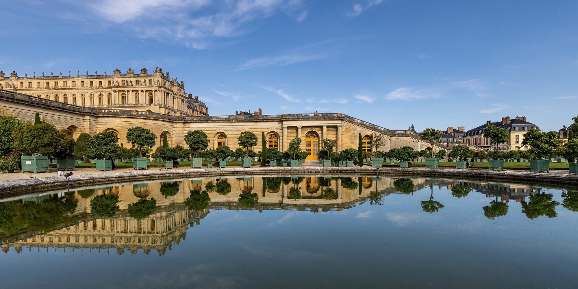 The Orangerie garden and the Palace of Versailles — French Classical Baroque grandeur, the seat of Louis XIV's absolutist State.
