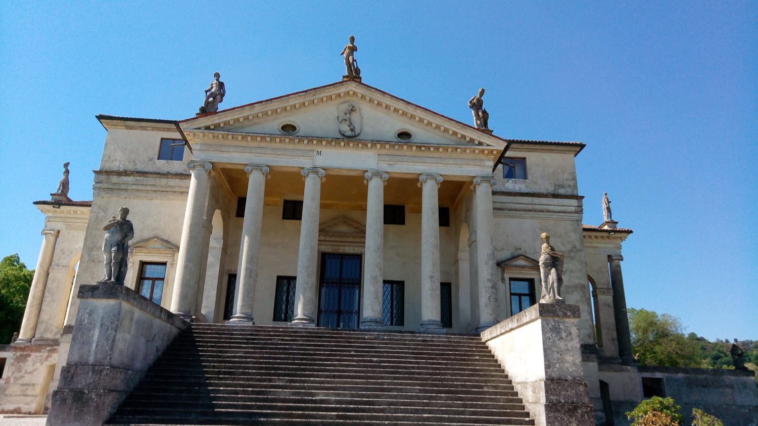 Palladio's Villa Capra 'La Rotonda' near Vicenza — symmetrical on both axes, four identical temple-front porticoes around a domed hall.