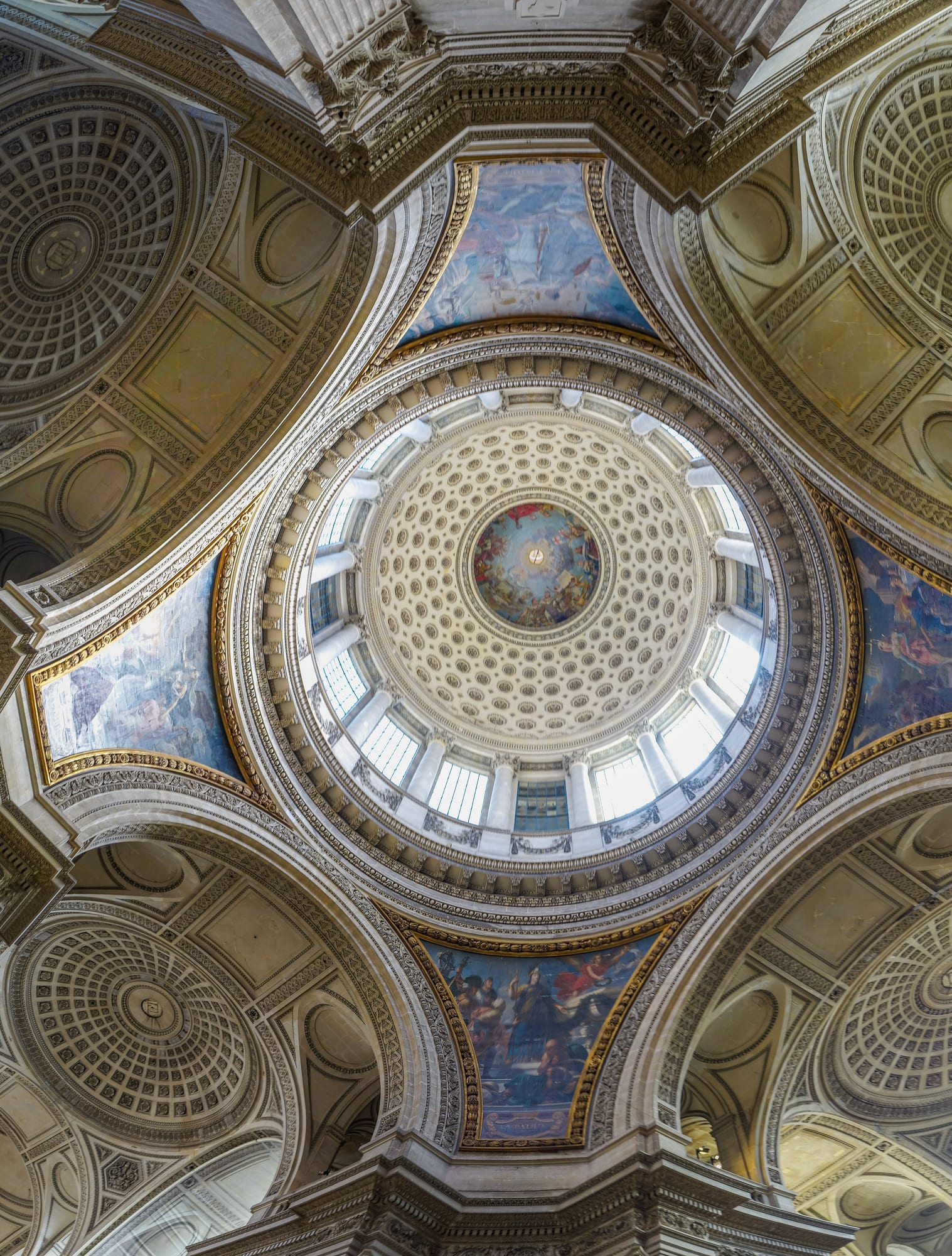 Inside the Panthéon — the dome carried on slender clustered piers, Soufflot's marriage of Gothic structural lightness with correct classical form.