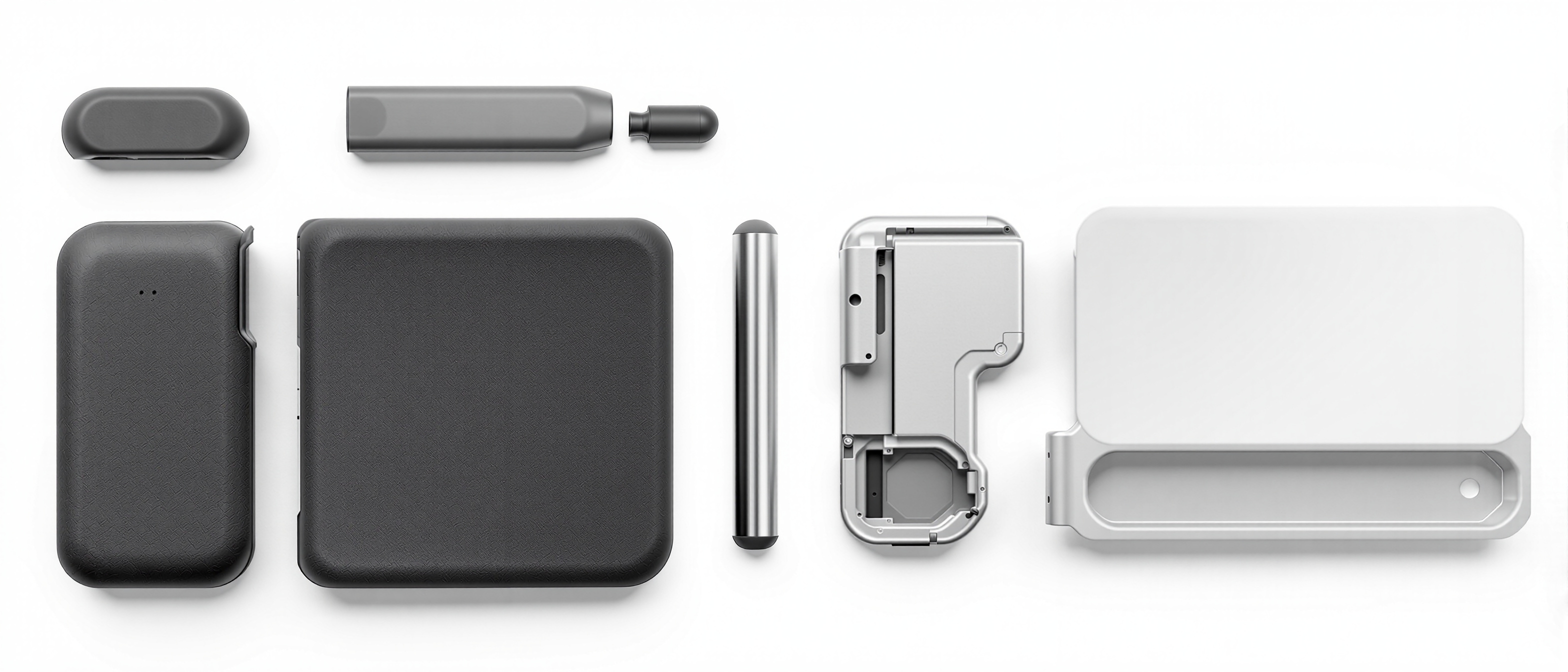 A flat-lay of a single product broken into its material parts — a rubber grip, a steel frame, a polymer casing — arranged to show design for disassembly, warm daylight, no text