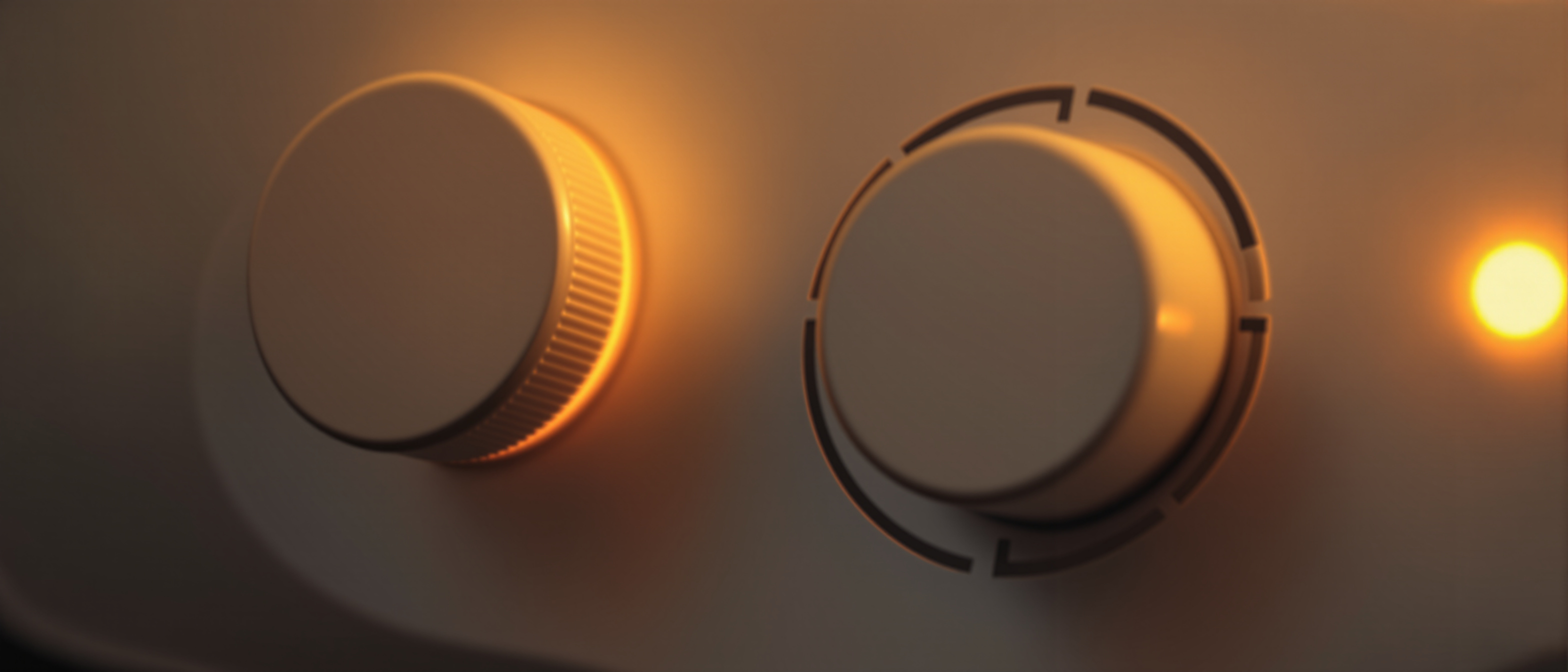 A close-up of a clean product control panel with a clearly shaped push button, a labelled dial and a status light in high contrast, warm daylight, precise and graphic, no legible text