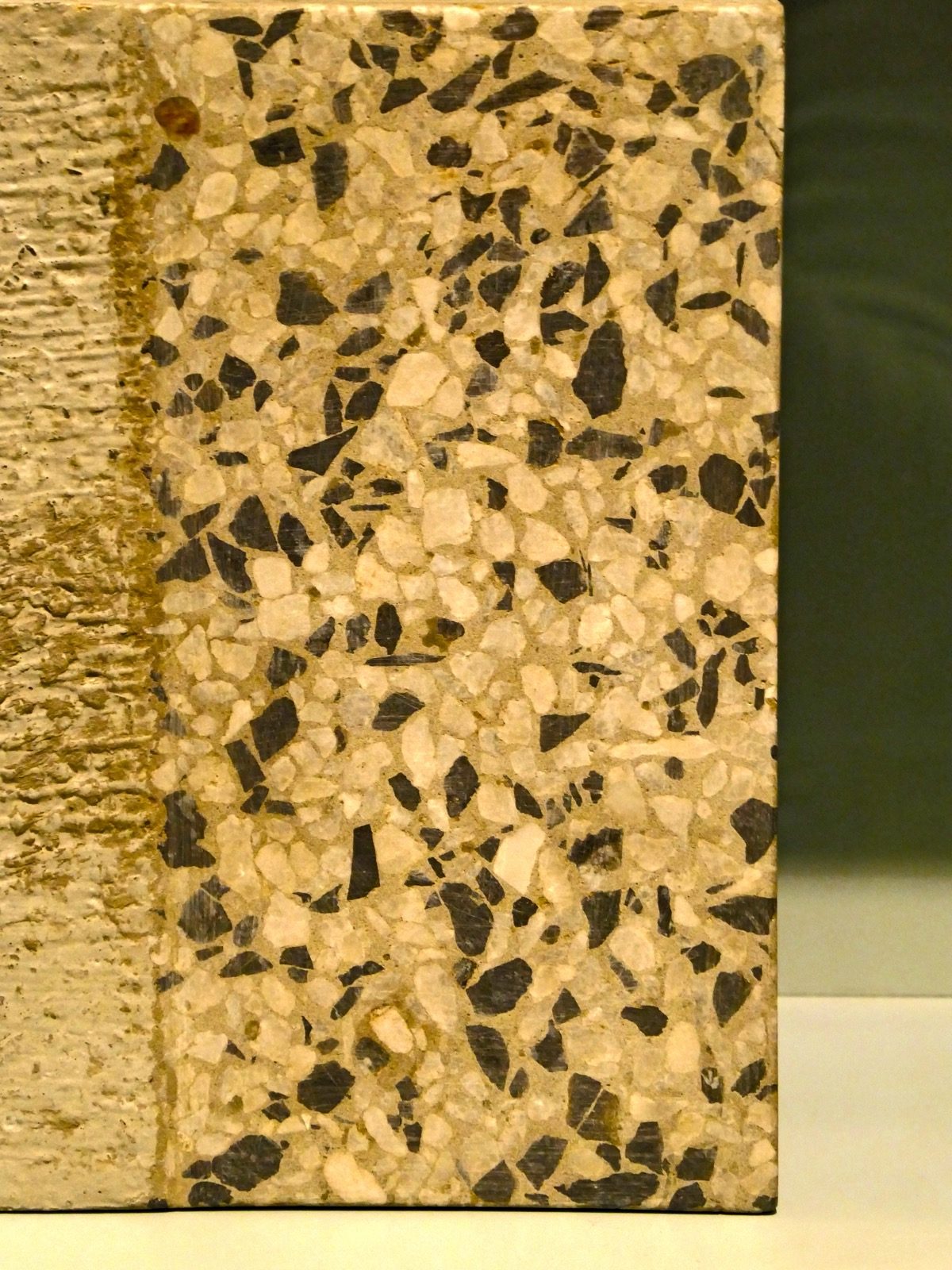 Terrazzo — marble and granite chips set in a polished matrix; a hard, seamless, durable flooring material.