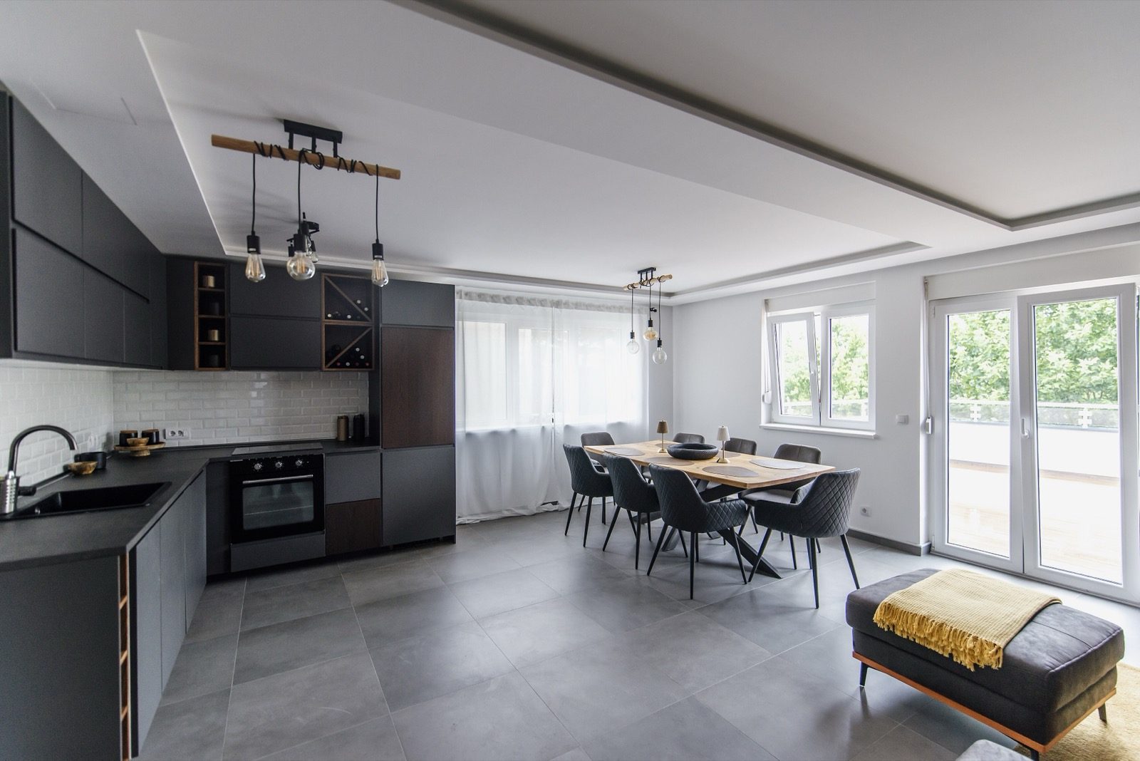 A modular kitchen — the carcass-and-shutter logic of fitted furniture: standardised boxes with interchangeable fronts.