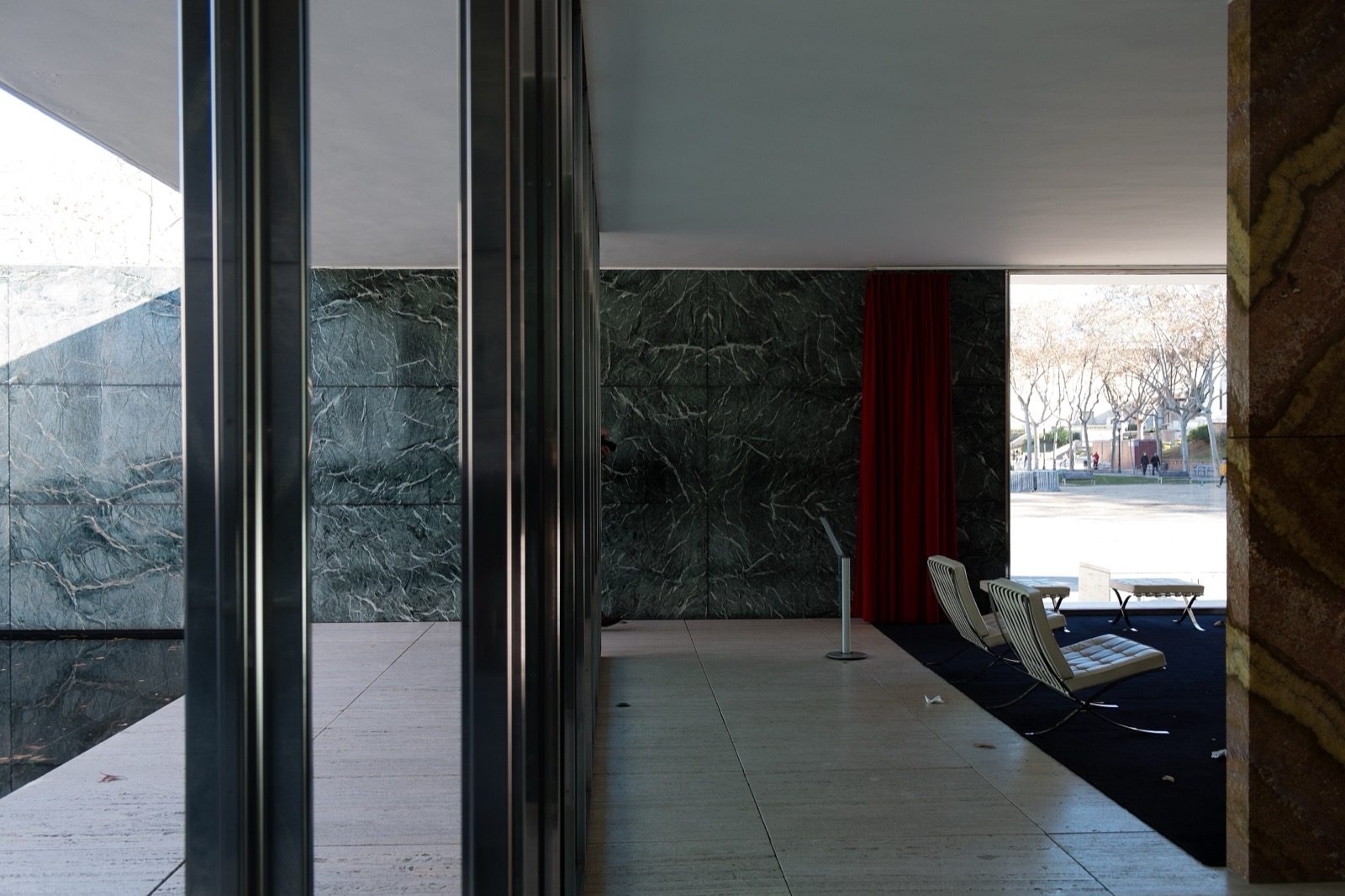 The Barcelona chair (Mies van der Rohe, 1929) — chromed flat steel and leather, designed for the German Pavilion at the Barcelona Expo.