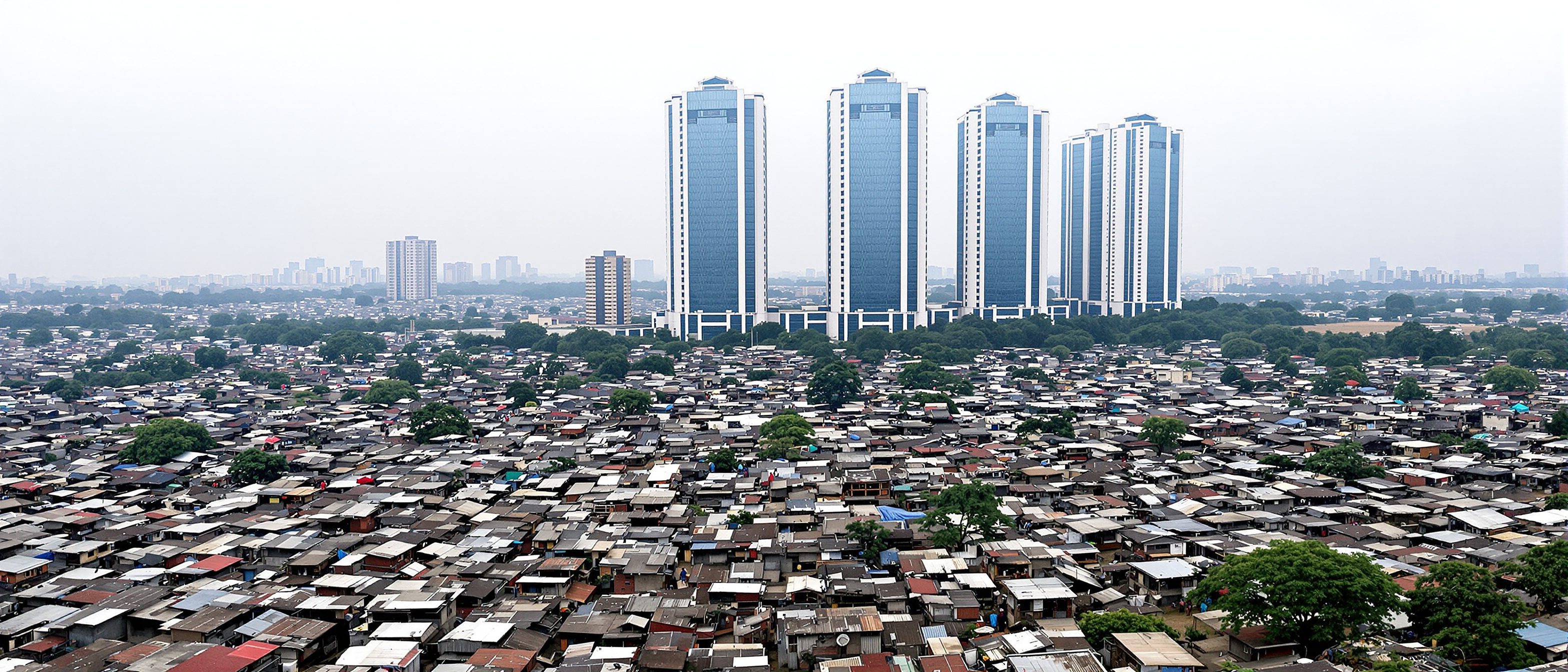 A dense informal settlement of closely packed tin and brick roofs beside a modern city skyline of high-rise towers — the stark adjacency of the informal and formal city that urban renewal must confront.